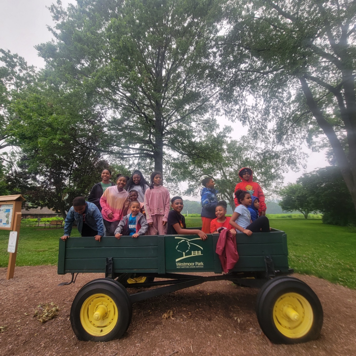 Children in Farm Cart at Park