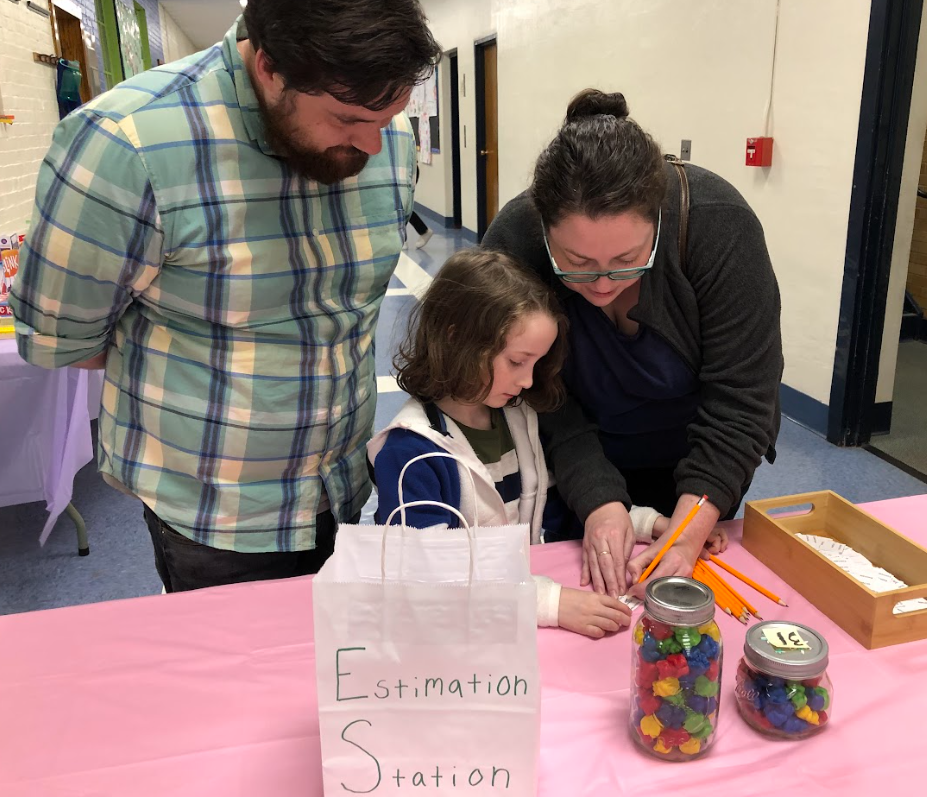 parents with child at math night